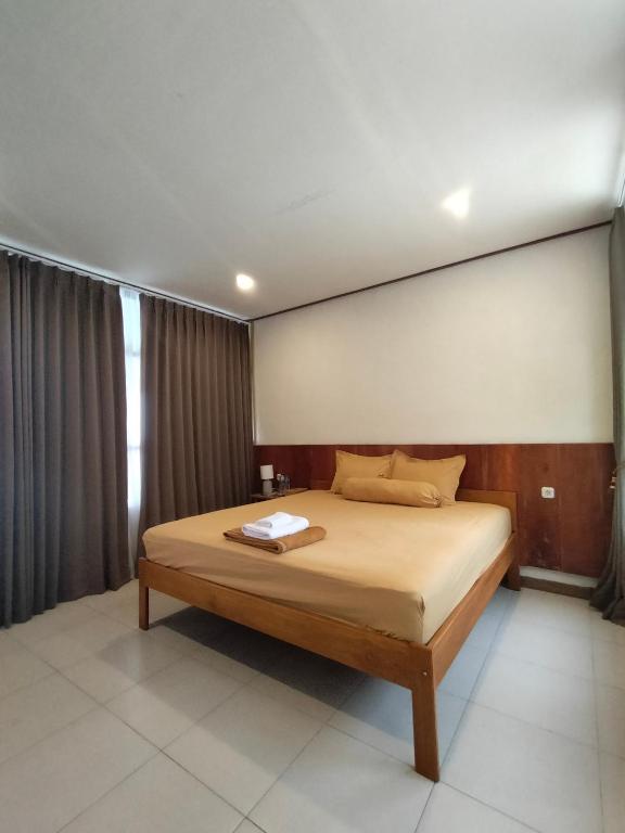 Kamar King dengan Balkon (King Room with Balcony)