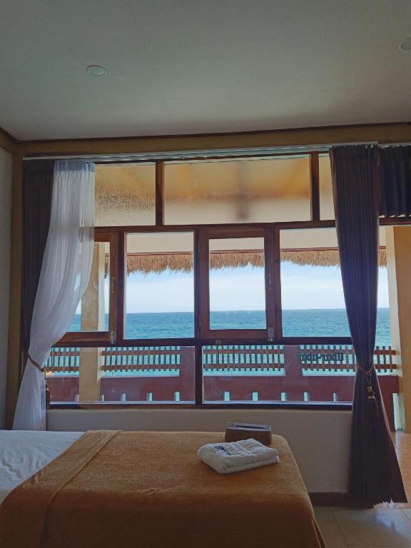 Kamar Deluxe Twin dengan Pemandangan Laut (Deluxe Twin Room with Sea View)