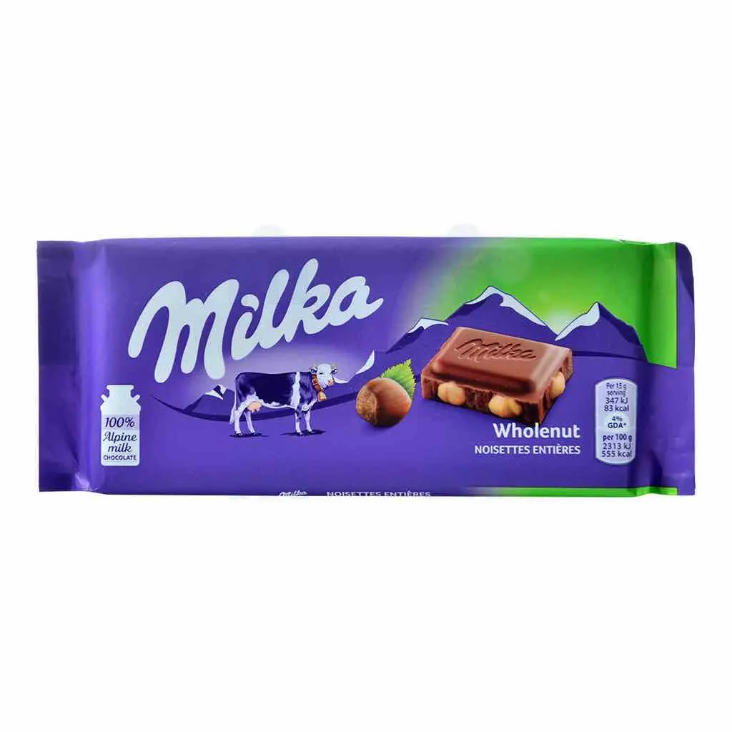 Tablette de chocolat au lait du pays Alpin et noisettes entières 90g - MILKA