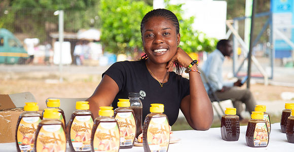 Student platform member at a market