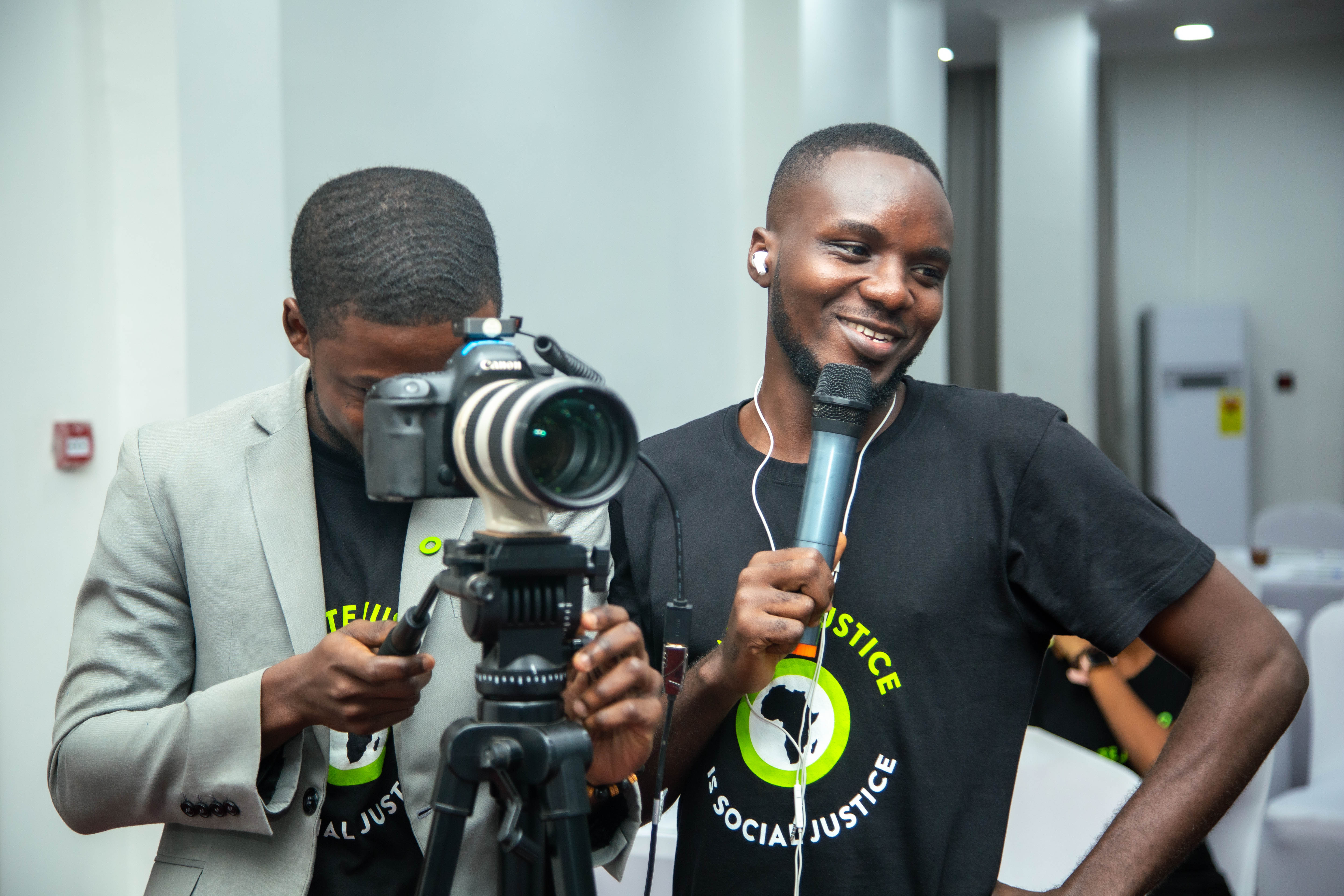 SYND media team recording with camera and microphone