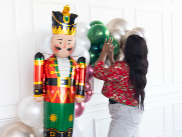 Party on Butler designing and installing holiday balloon decor