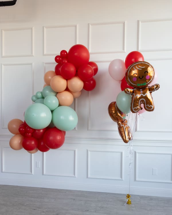 Holiday organic balloon garland in red and sage in Pittsburgh by Party on Butler