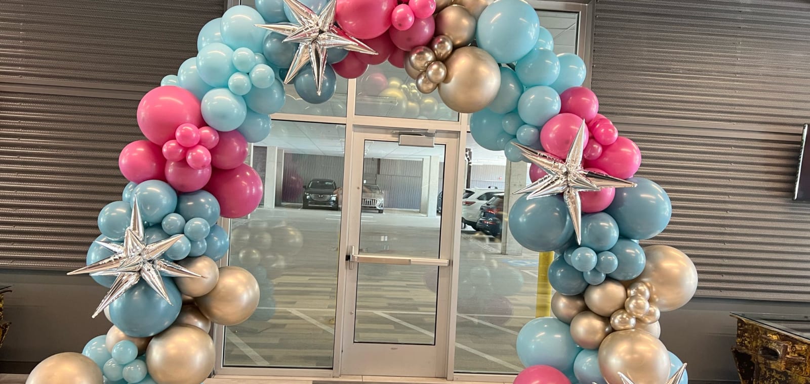 Balloon arch framing a Pittsburgh event