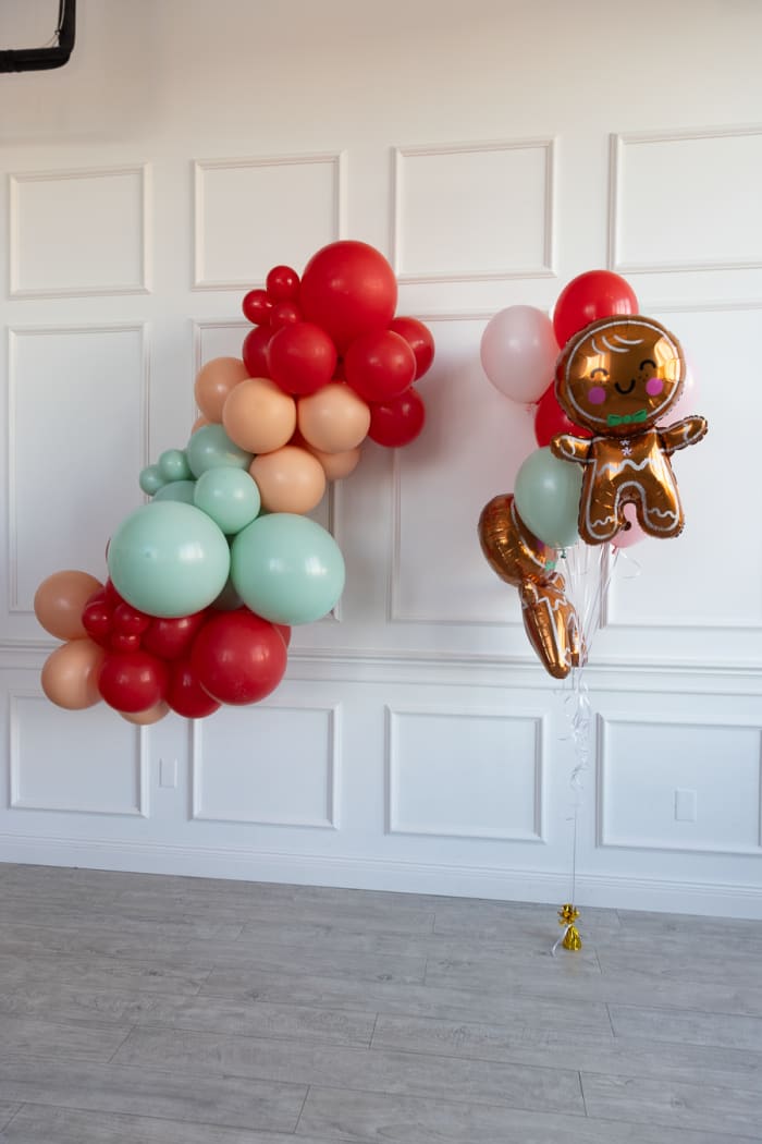 Holiday balloon garland in red and sage in Pittsburgh by Party on Butler