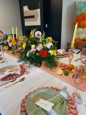 Event florals styled for a venue tablescape