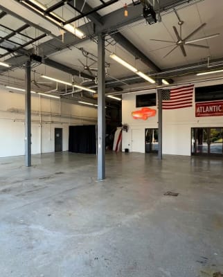 Open garage-door event space at Party on Butler in Pittsburgh