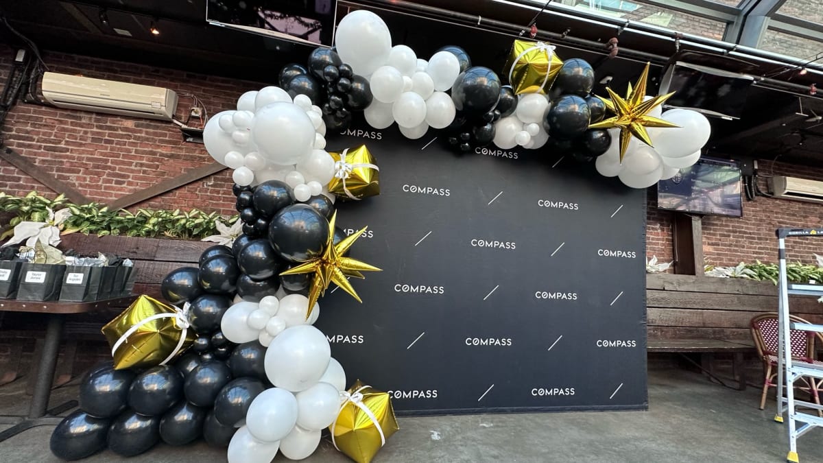 Colorful balloon garland and arch setup delivered and installed by Party on Butler for a Pittsburgh birthday celebration