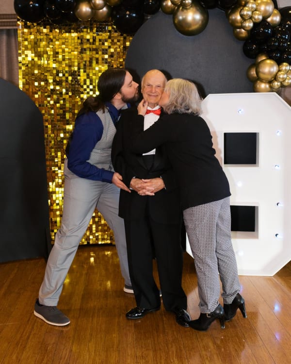 90th birthday celebration with a black and gold balloon backdrop by Party on Butler in Pittsburgh