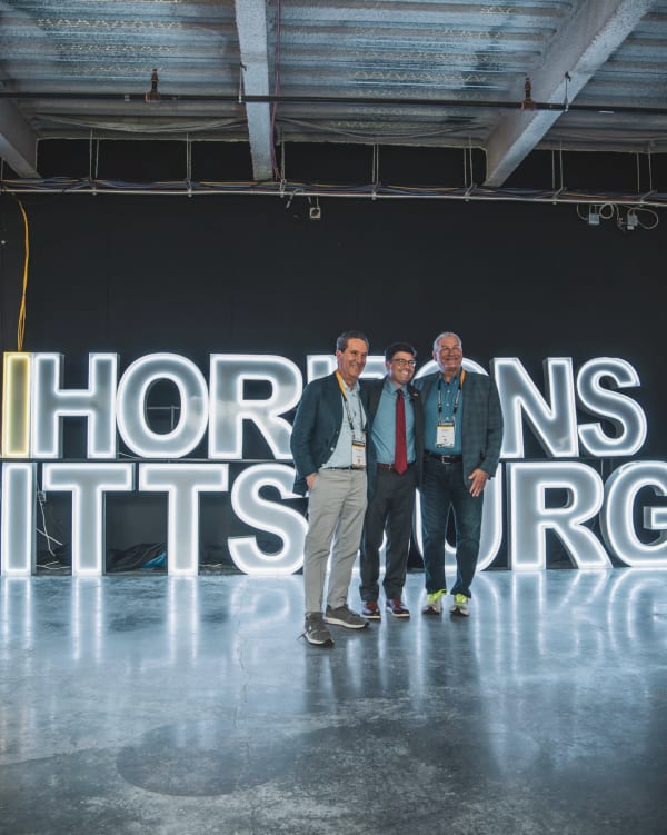 Giant lit HORIZONS PITTSBURGH marquee letters at the AI Horizons summit by Party on Butler