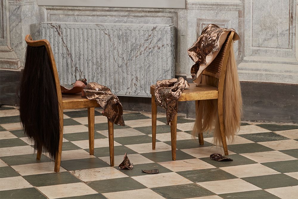 Magda von Hanau, Monā I & Monā II, 2025, Antique chair, hair, clay, metallic gaze, 86 x 50 x 60 cm & 90 x 50 x 60 cm