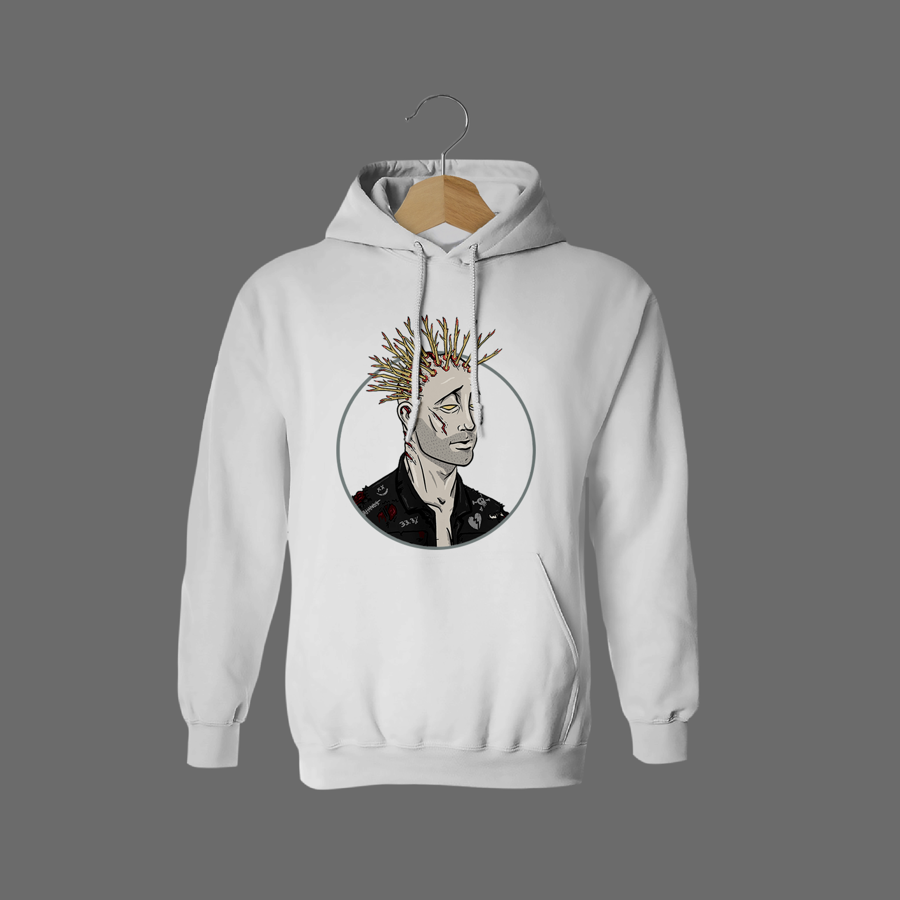 Front of tote bag with washed black canvas body, black straps, and tan leather handles and accents.