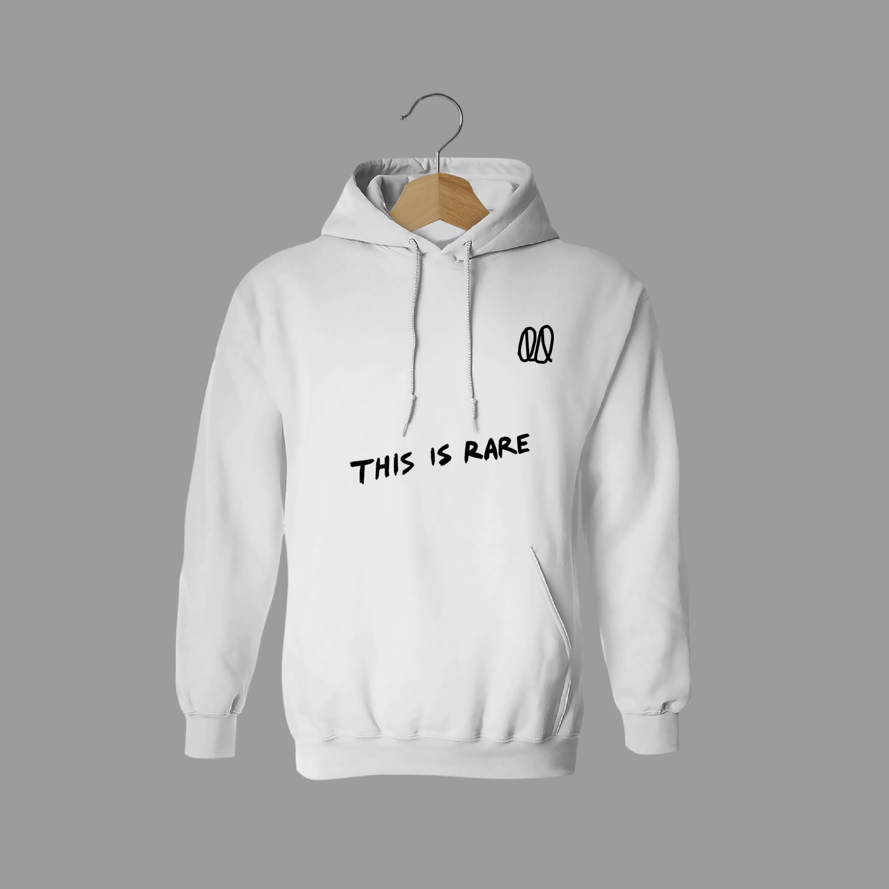 Front of tote bag with washed black canvas body, black straps, and tan leather handles and accents.