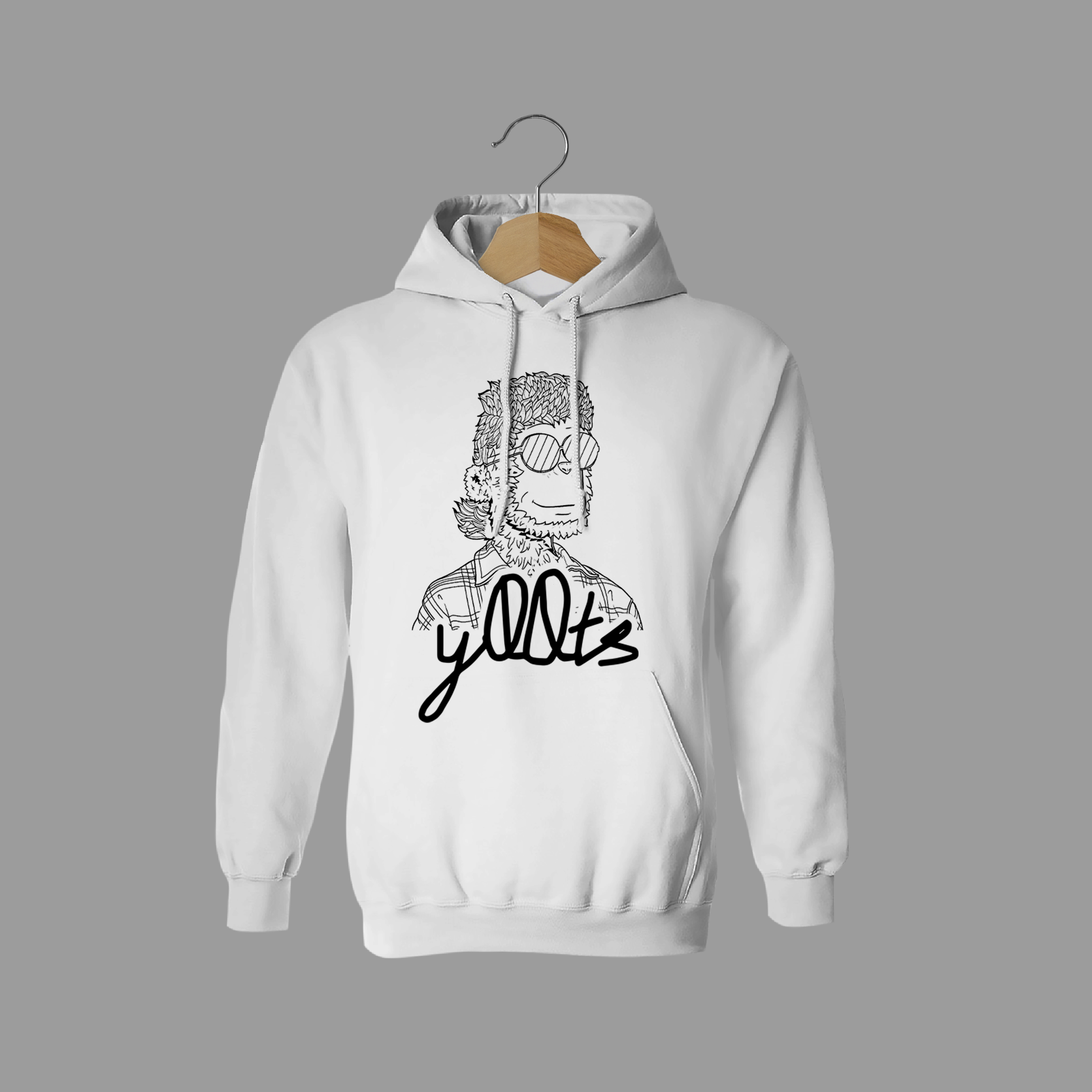 Front of tote bag with washed black canvas body, black straps, and tan leather handles and accents.