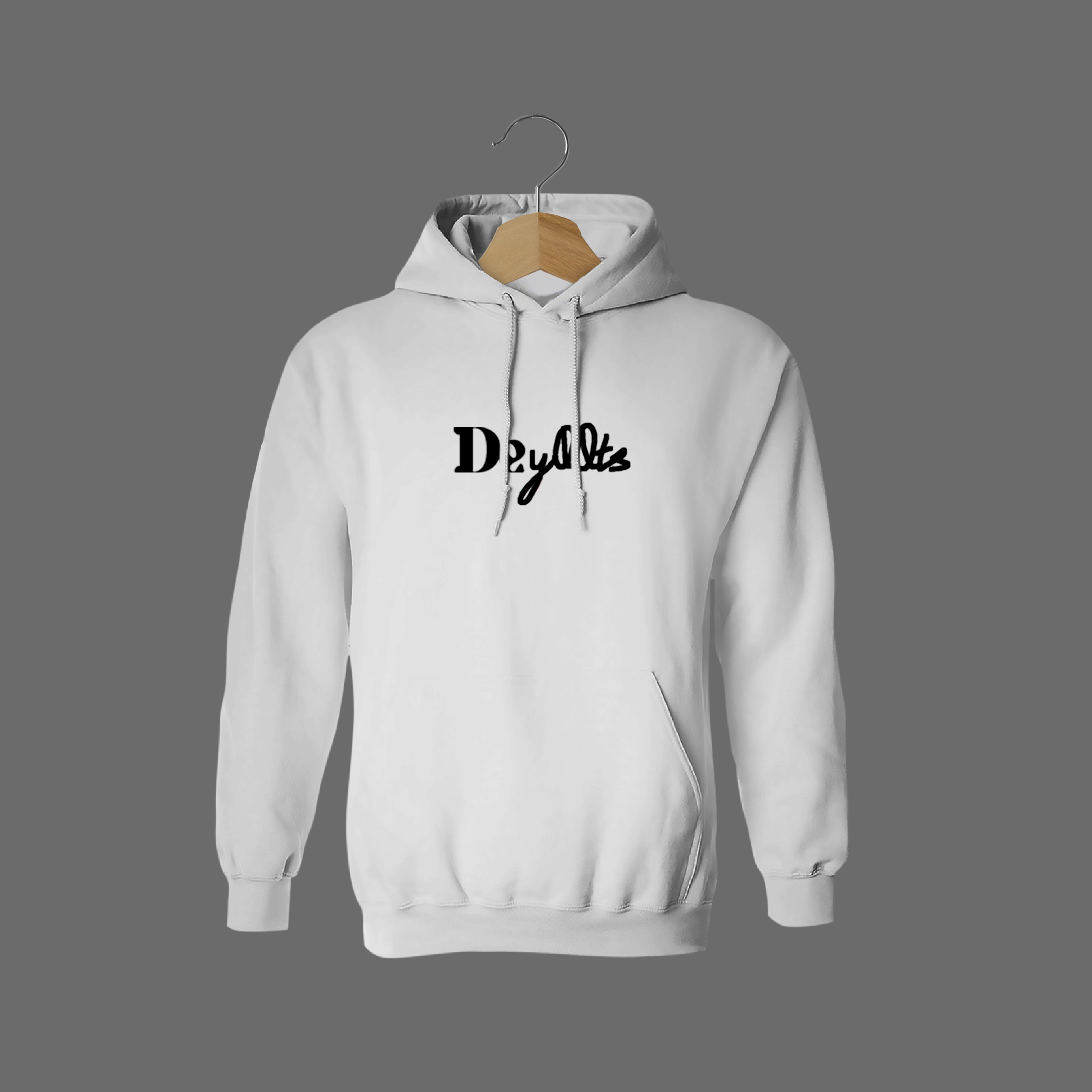 Front of tote bag with washed black canvas body, black straps, and tan leather handles and accents.