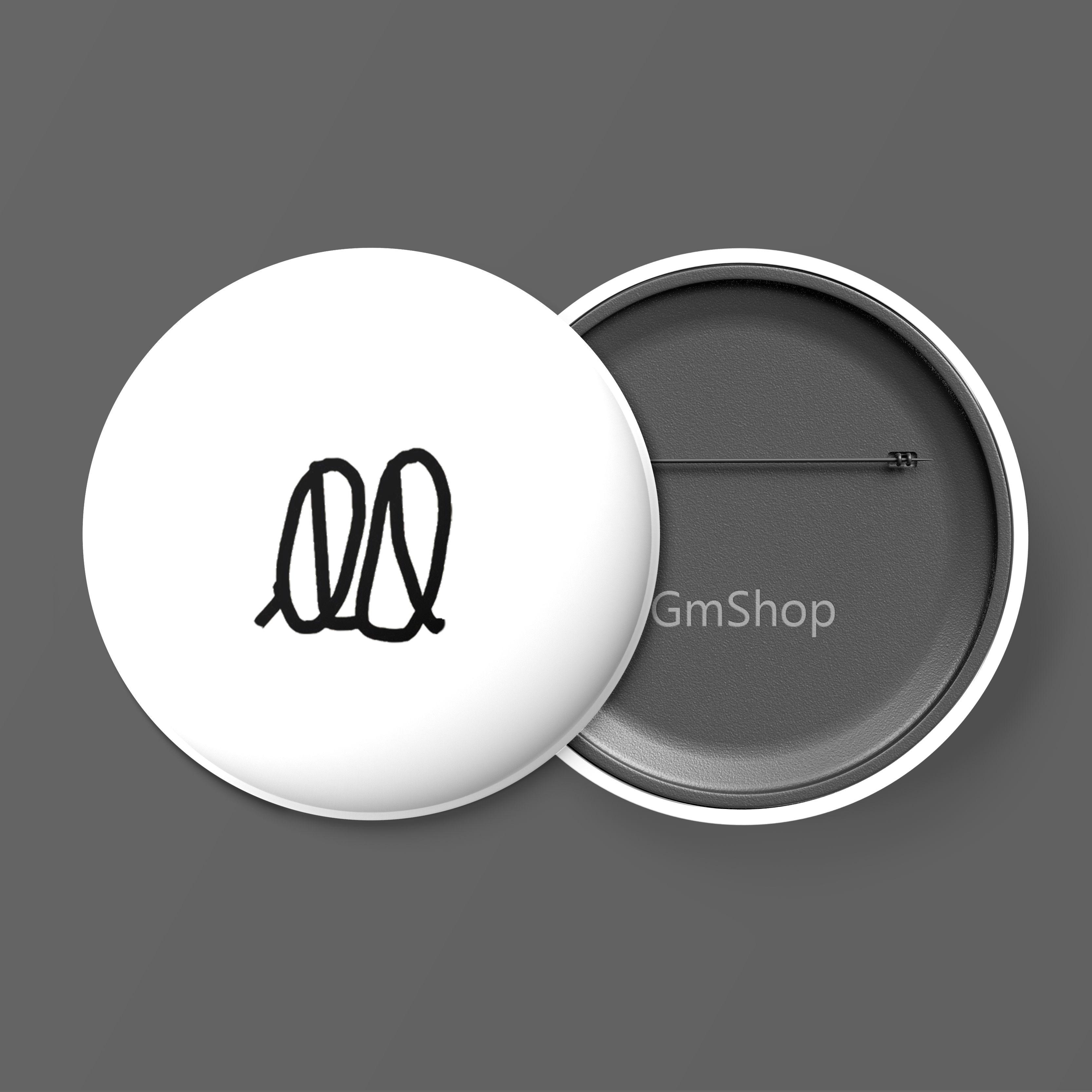 Front of tote bag with washed black canvas body, black straps, and tan leather handles and accents.