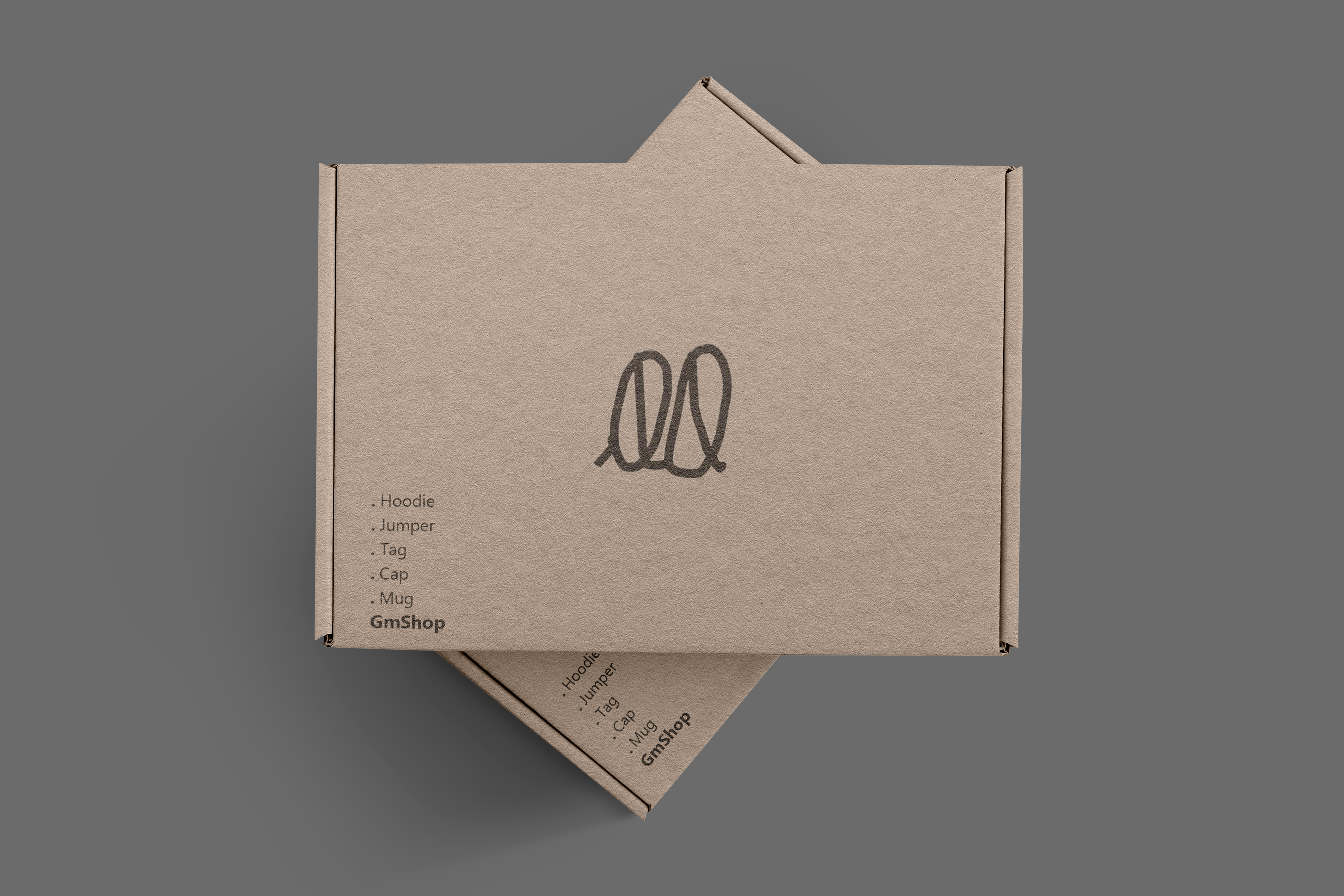 Front of tote bag with washed black canvas body, black straps, and tan leather handles and accents.