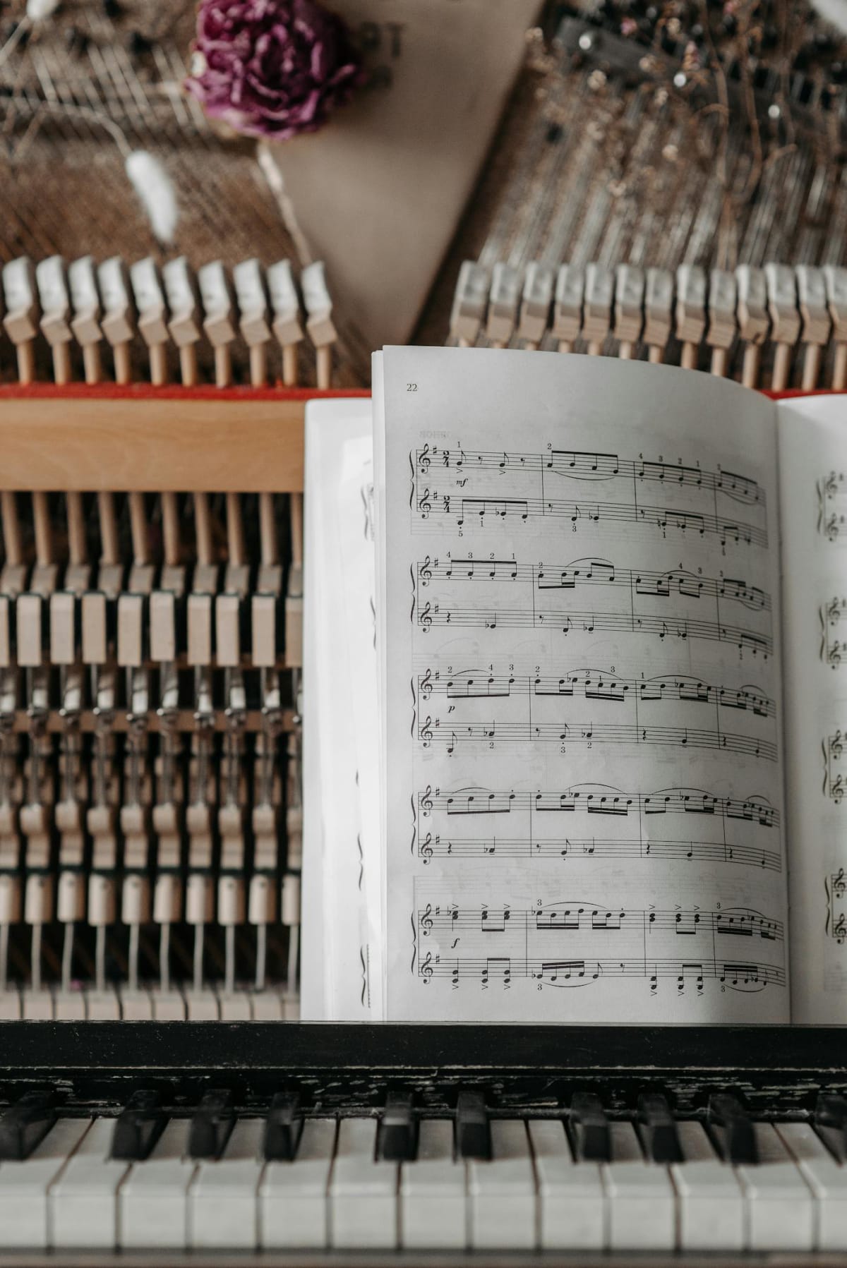 Sheet music resting on a piano during a focused practice session