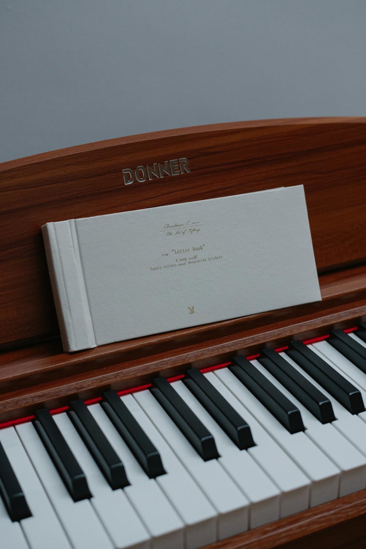 Close-up of a piano with sheet music open during repertoire study
