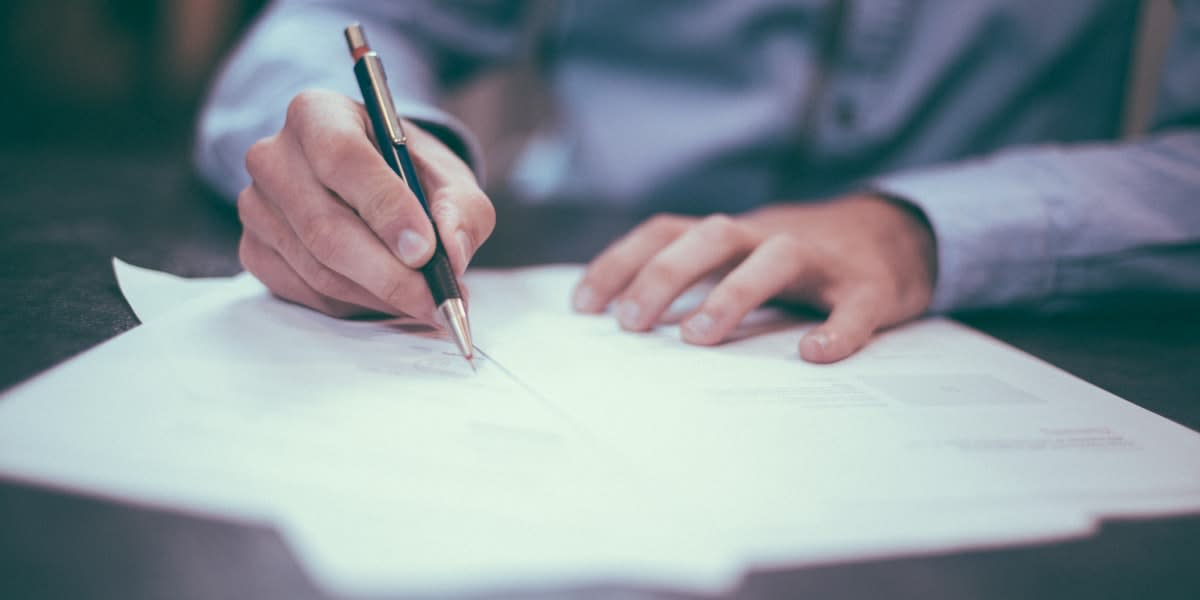 Creator reviewing contract terms and legal agreements