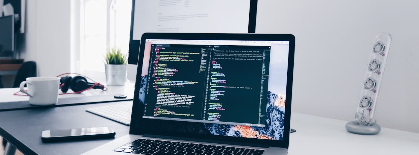 Laptop and digital tools representing the creator technology stack