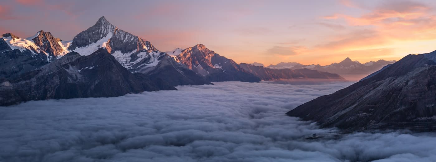 Mountain landscape at golden hour representing brand narrative and storytelling at scale