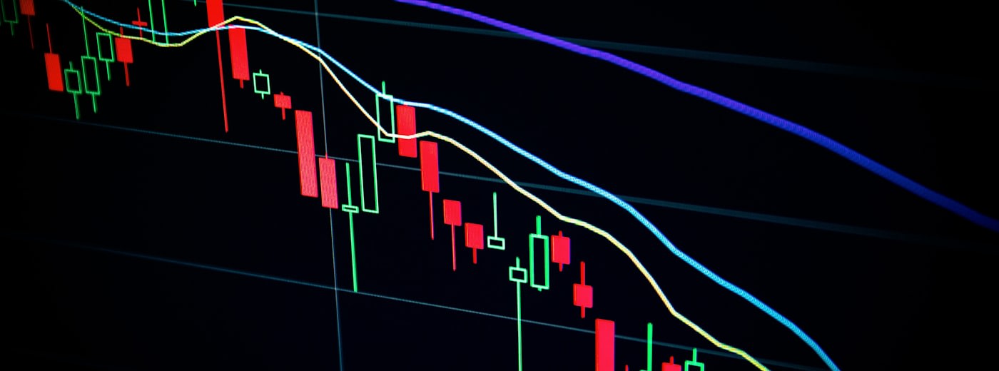 Stock market data on screen representing creator economy investment and venture capital trends