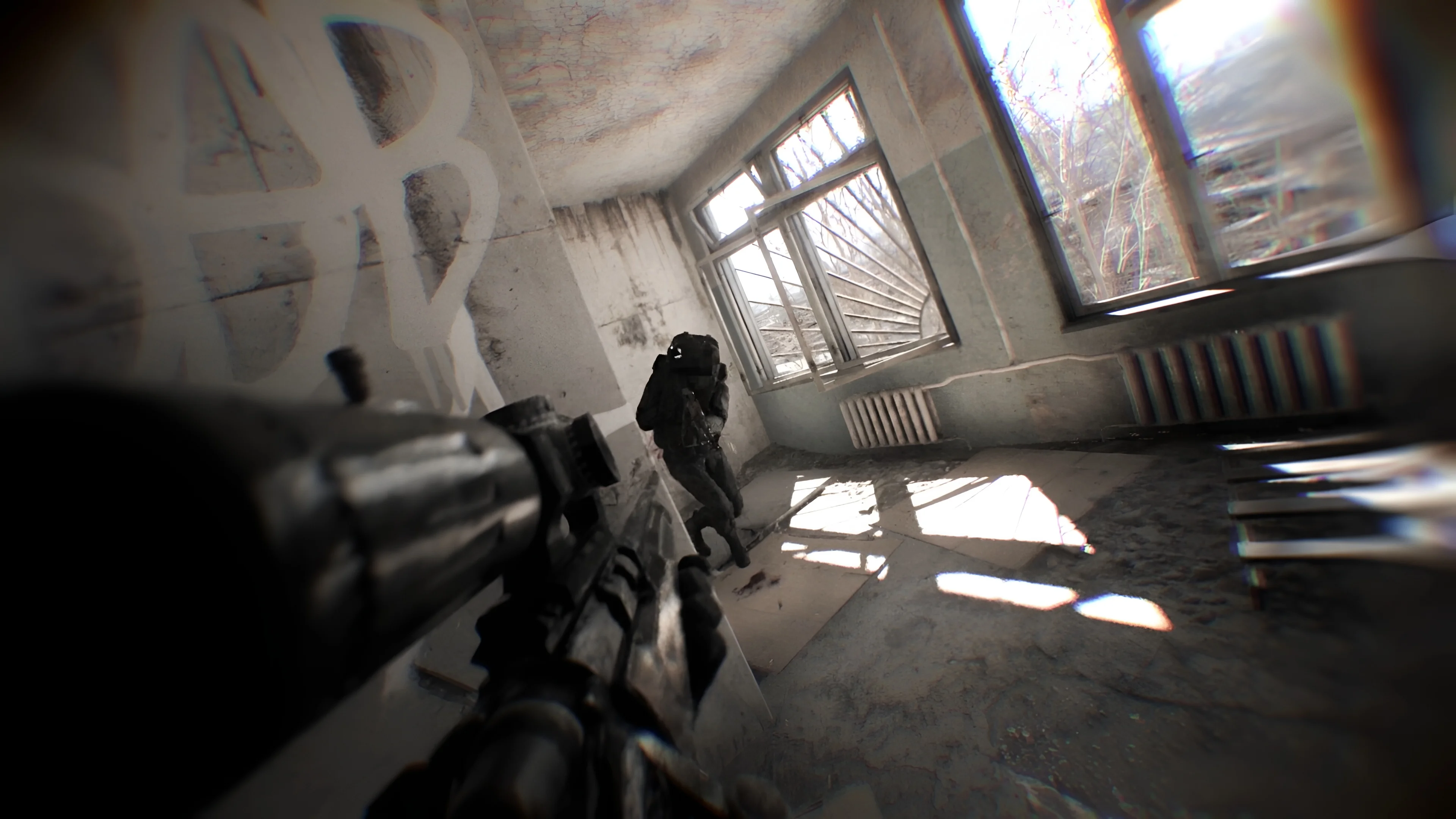 Operator facing an opposing team inside a building.
