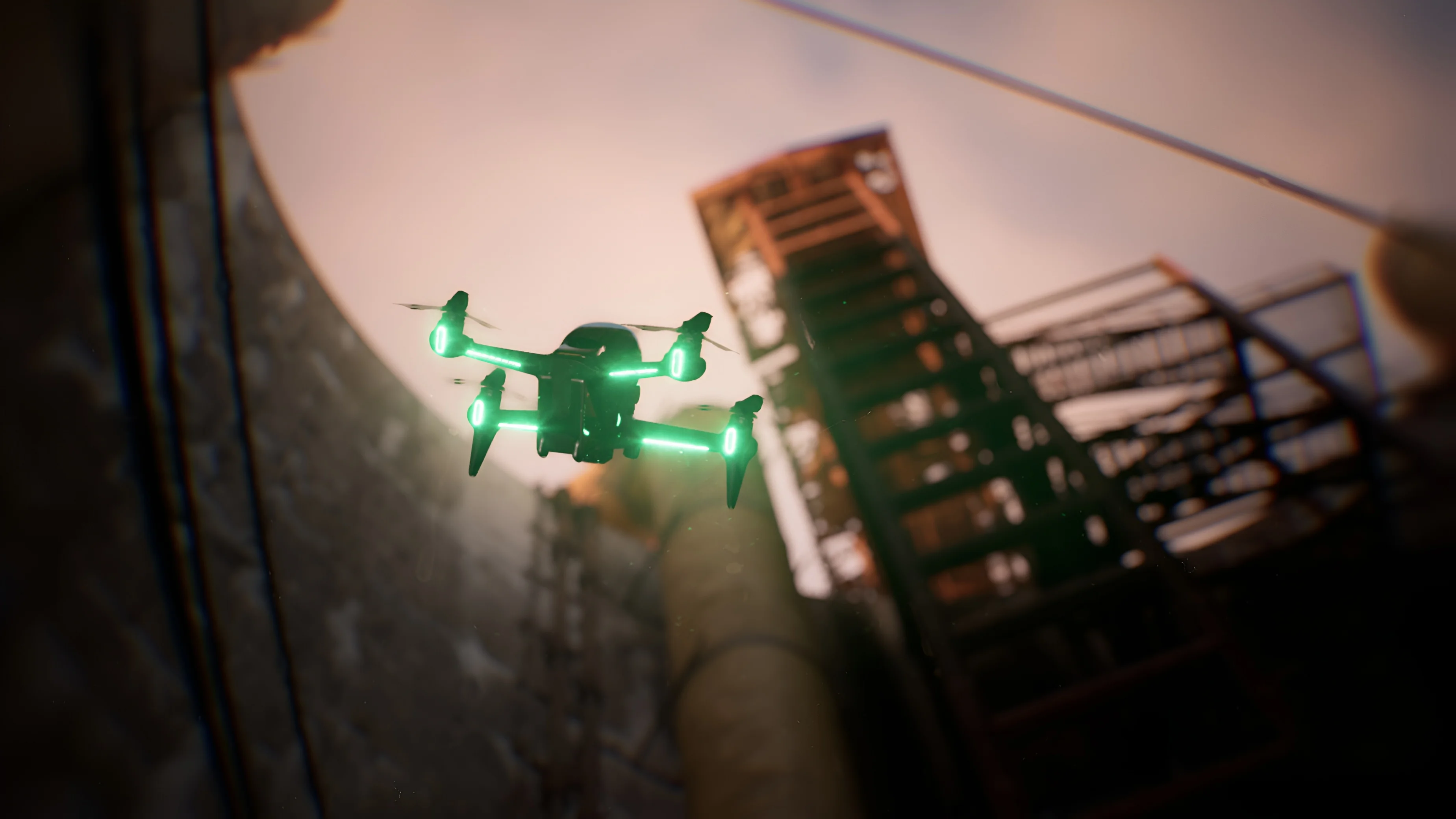 Military drone near an industrial building
