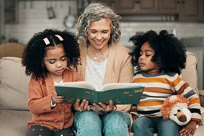 Grandma reading to children