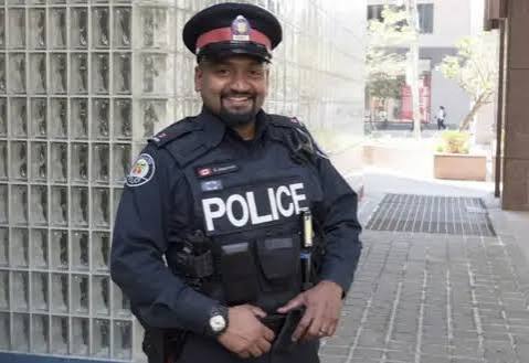 Police officer and car
