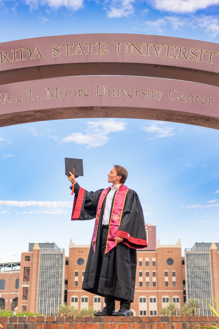 Candid walking grad photo at FSU
