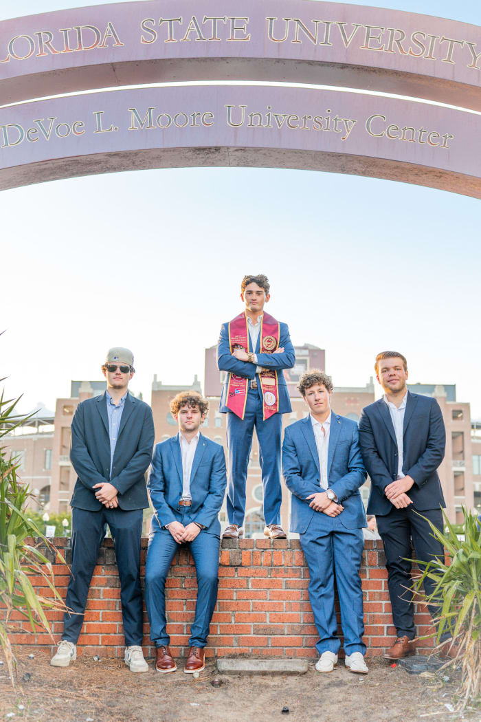Creative FSU grad photo idea at dusk