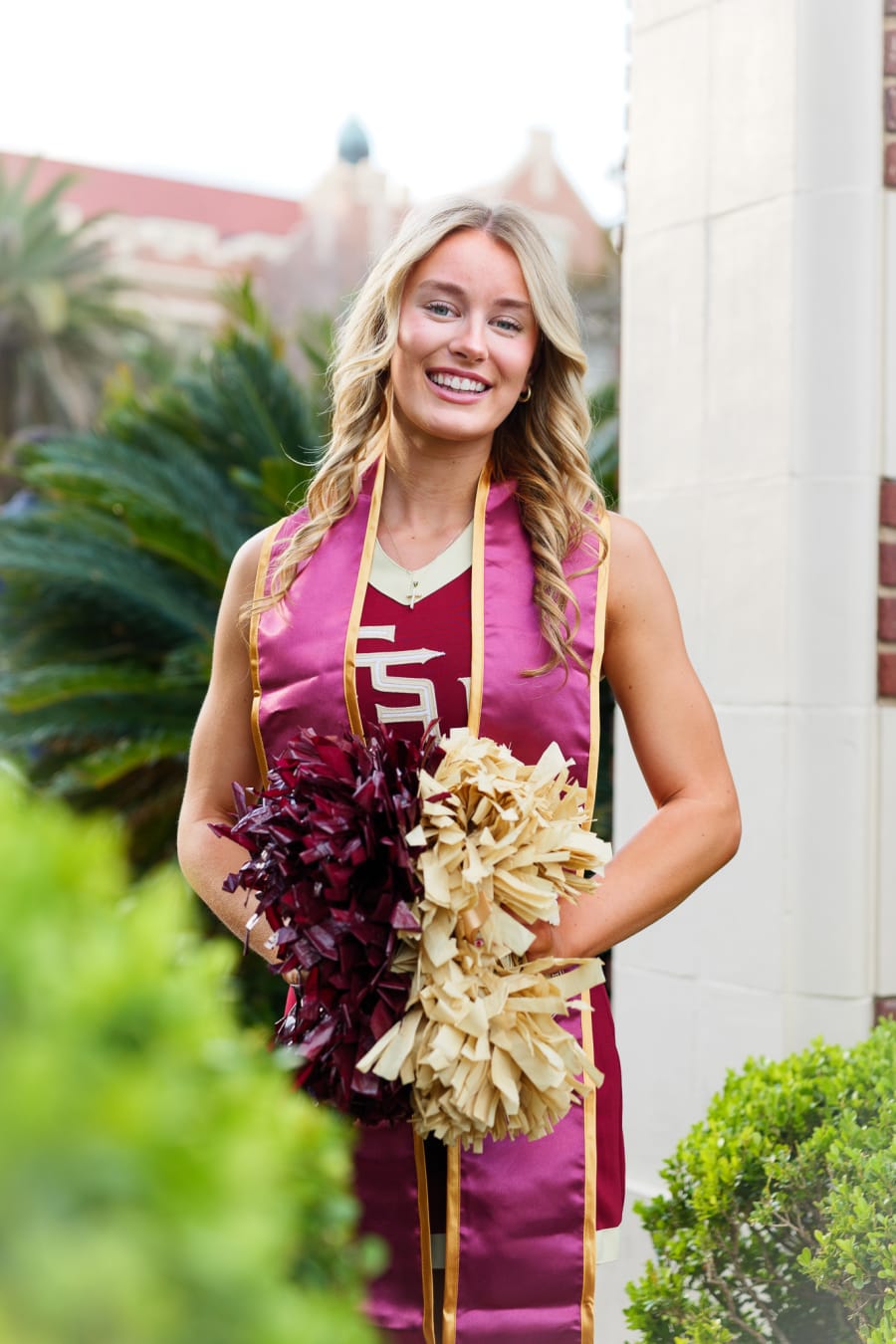 FSU grad photo outfit colors against campus brick