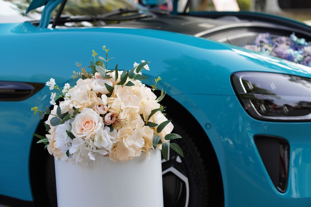 Engagement · Bouquet on Luxury Car