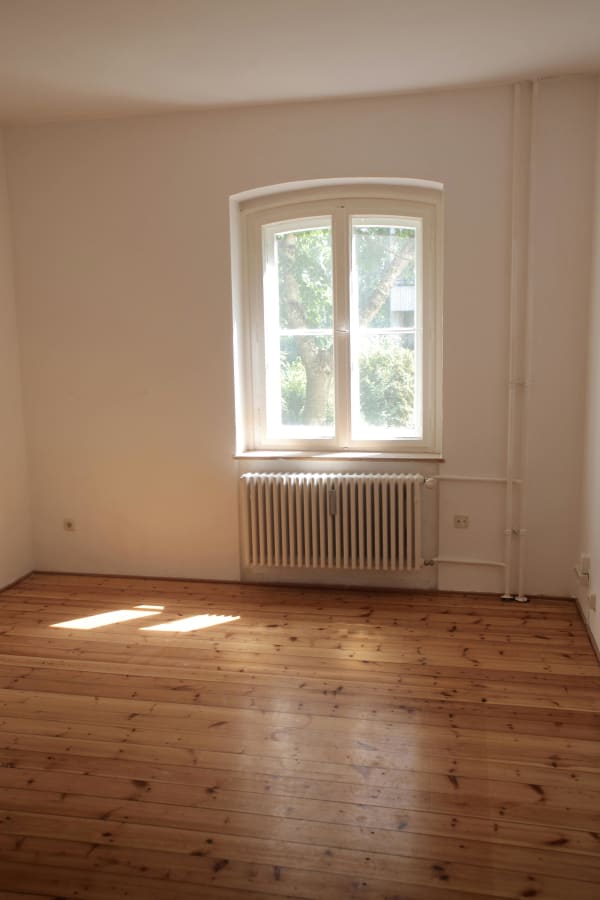 What are the advantages of unfinished hardwood flooring in Hazel Green, AL