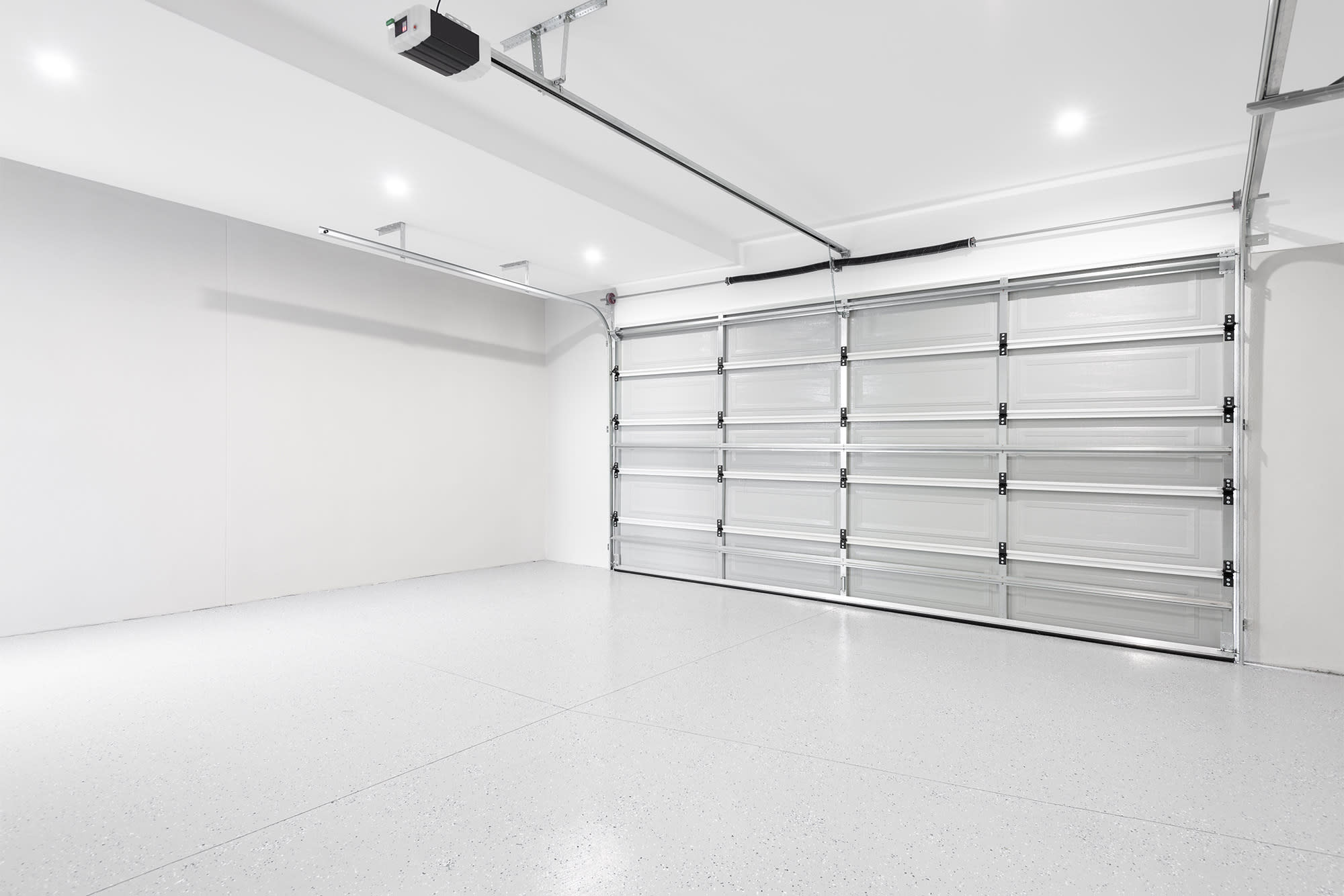 Why Nebraska Winters Destroy Garage Floors (and How Epoxy Saves Them)