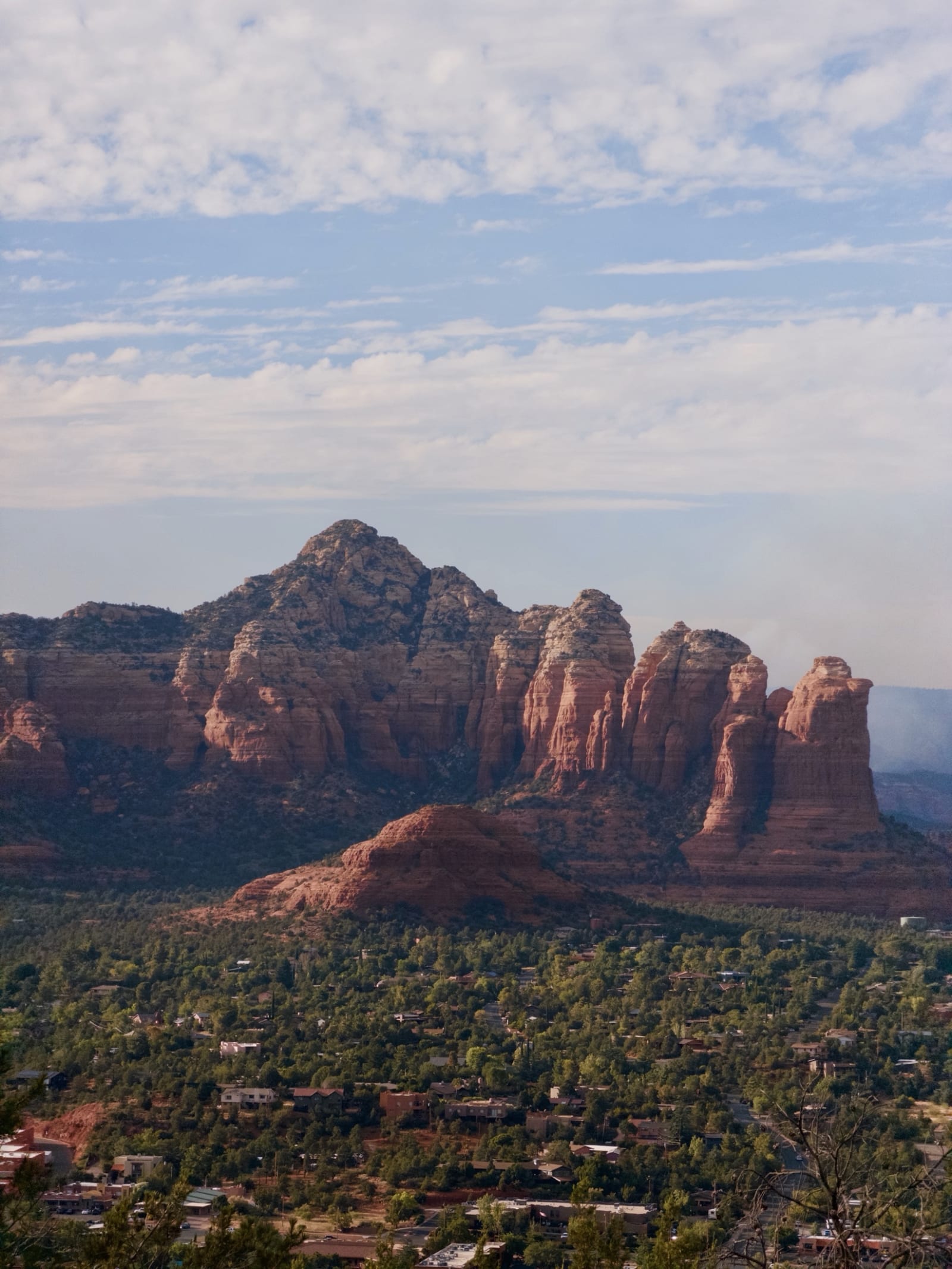 Red sandstone buttes under a broad desert sky