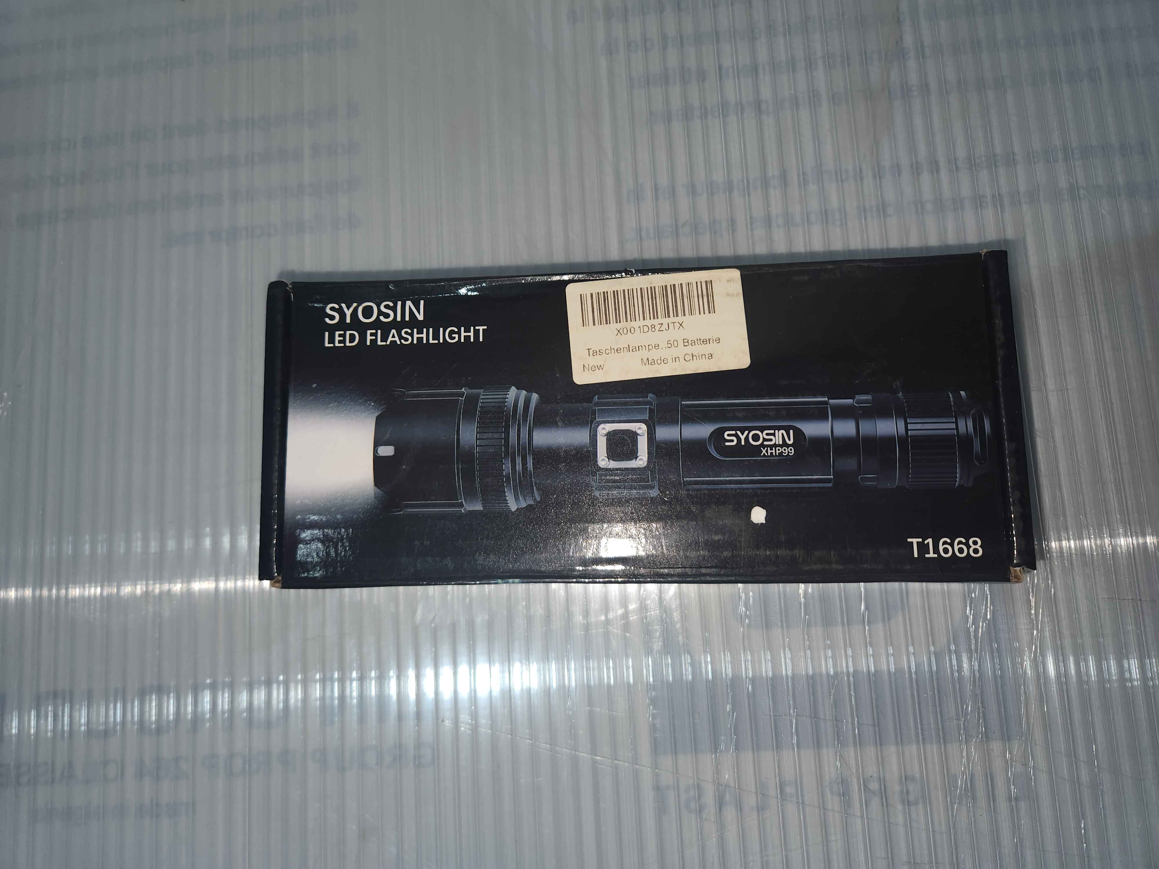 Lampe Torche LED SYOSIN T1668 XHP99 - Ultra Puissante, Rechargeable USB & Zoomable