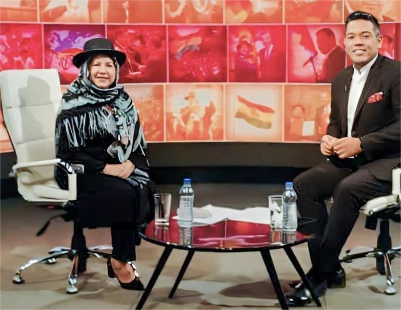 Celinda Sosa con combrero y rostro cubierto.jpg