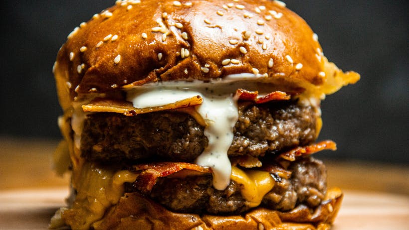 A two-tier burger with lots of cheese.