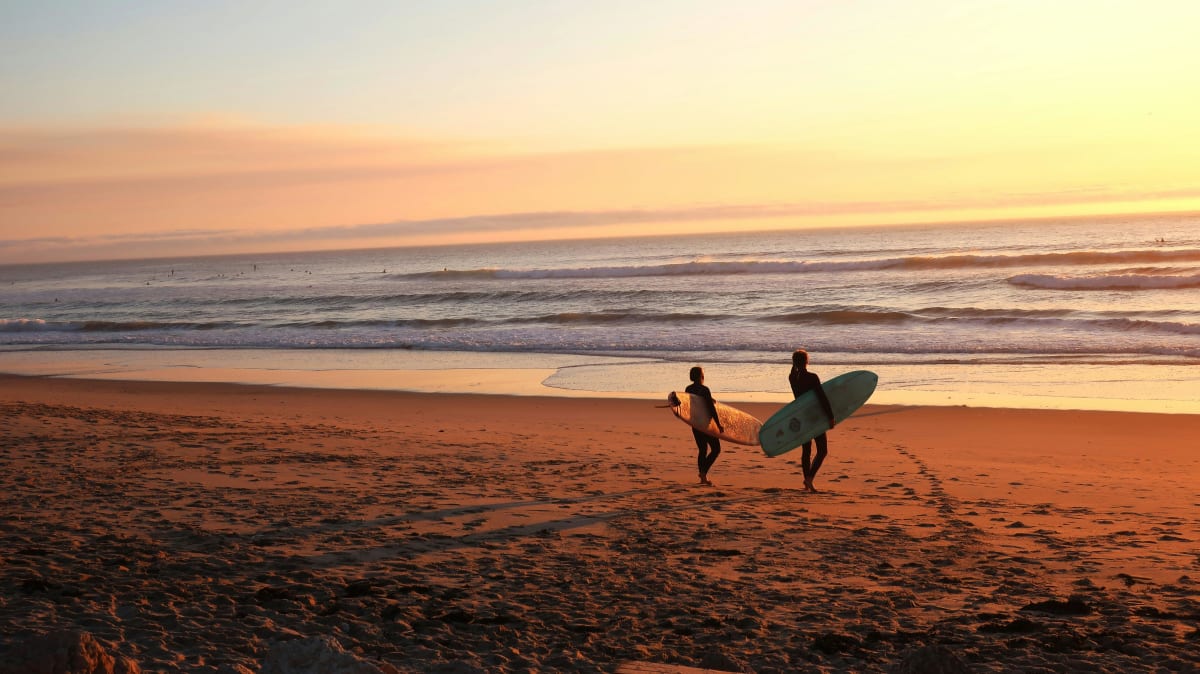 two surfers at the bach 