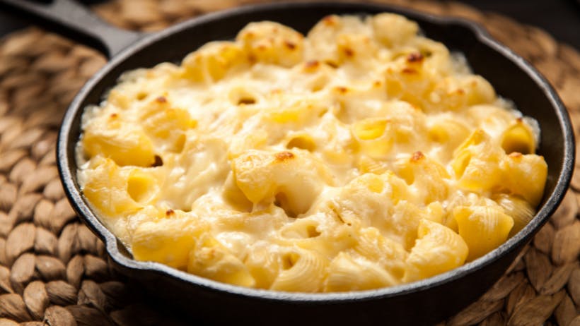 Mac & Cheese in a black skillet.