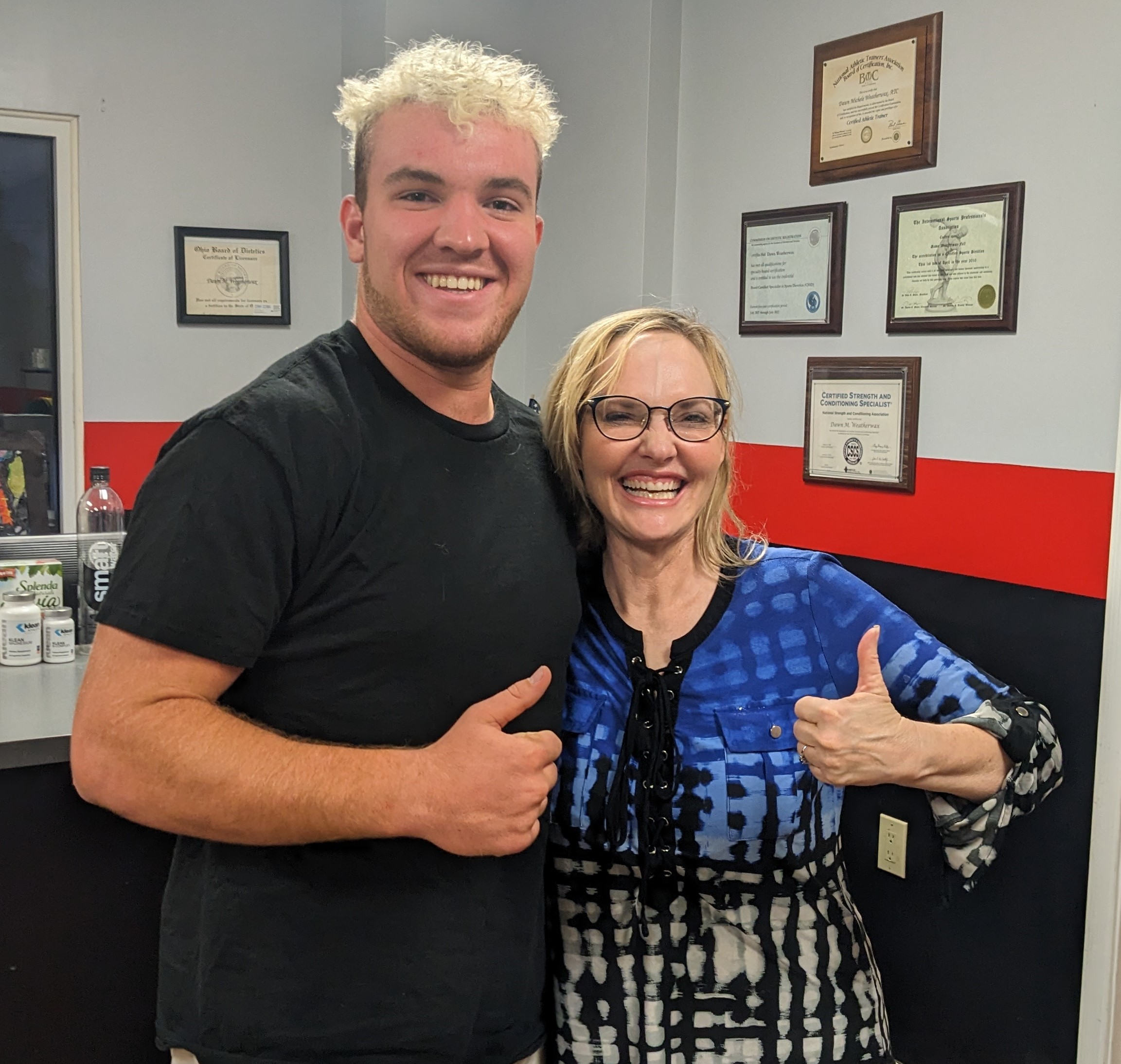 Micah Markley and Dawn giving thumbs up