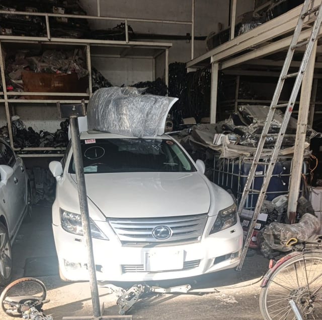 White Lexus LS460 sedan front end for parts — grille, headlights, bumper and hood, Sharjah market