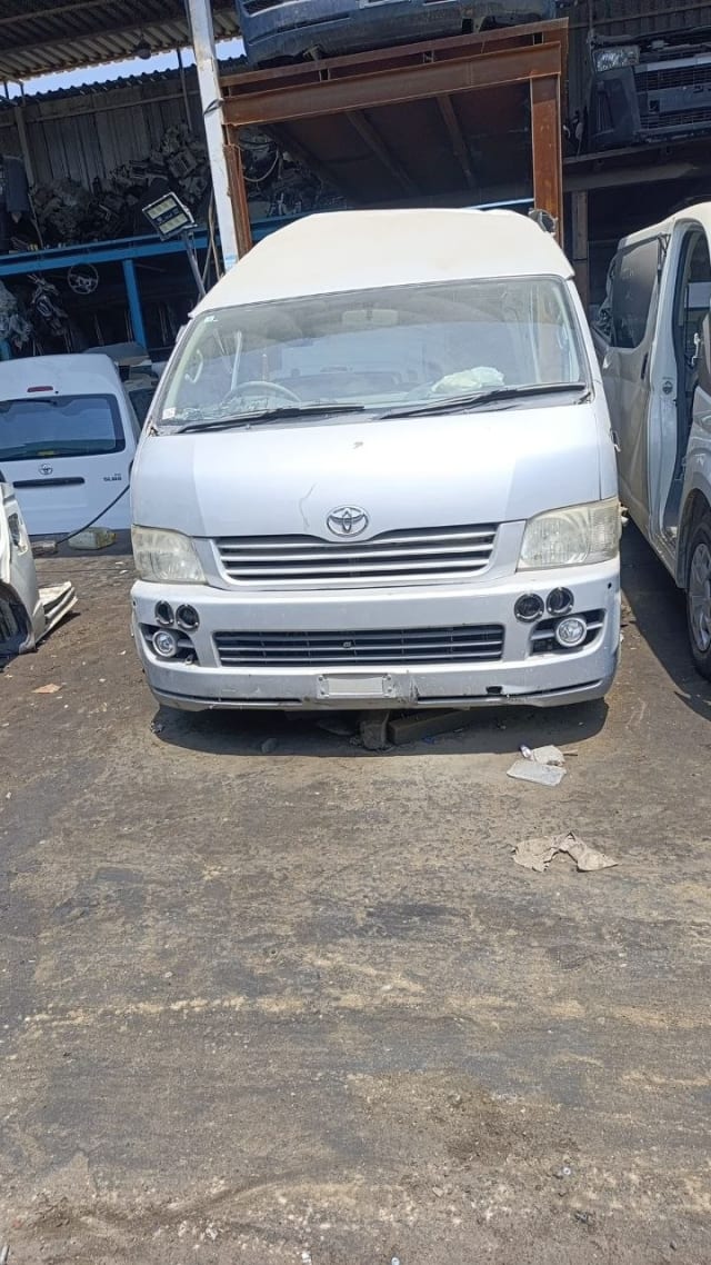 Silver Toyota Hiace van front — bumper, grille, headlights and fog lamps, Sharjah market
