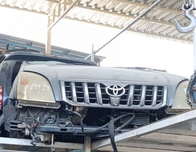 Silver-grey Toyota Land Cruiser Prado front halfcut — grille, hood and headlights, Sharjah market