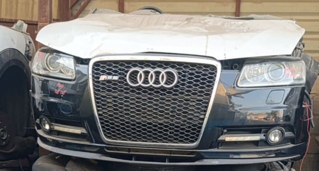 Black Audi A6 front cut — RS-style grille, headlights and front bumper, Sharjah market