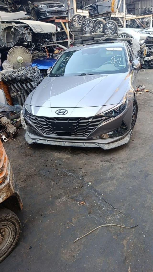 Silver Hyundai Elantra sedan front — grille, headlights, hood and bumper, Sharjah market