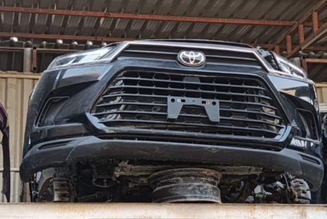 Black Toyota Sequoia SUV halfcut front cut — bumper, grille and headlights, Sharjah market
